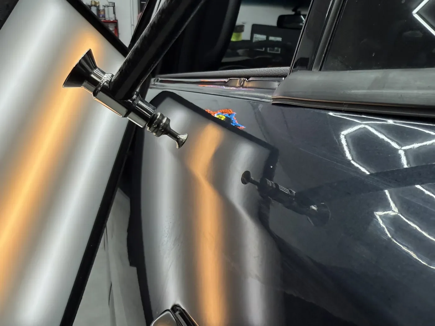 Black Kat Dent Co. St. Louis MO auto repair, dent repair, hail damage repair and car detailing experts.