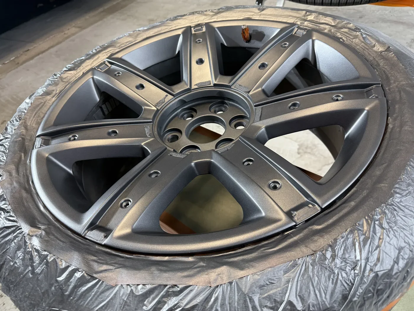 Black Kat Dent Co. St. Louis MO wheel repair services for restoring damaged and scratched wheels.